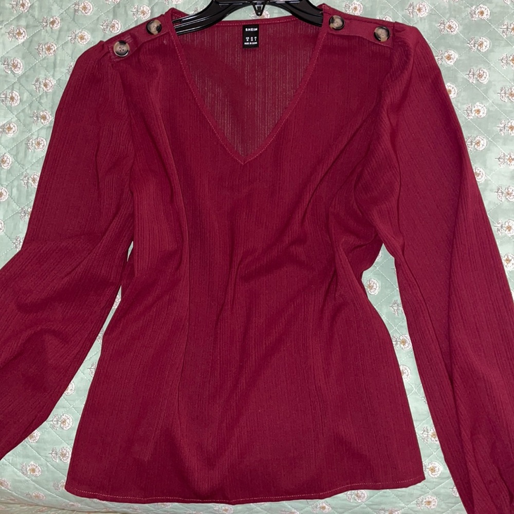 Maroon blouse with beautiful sleeves and button  shoulders